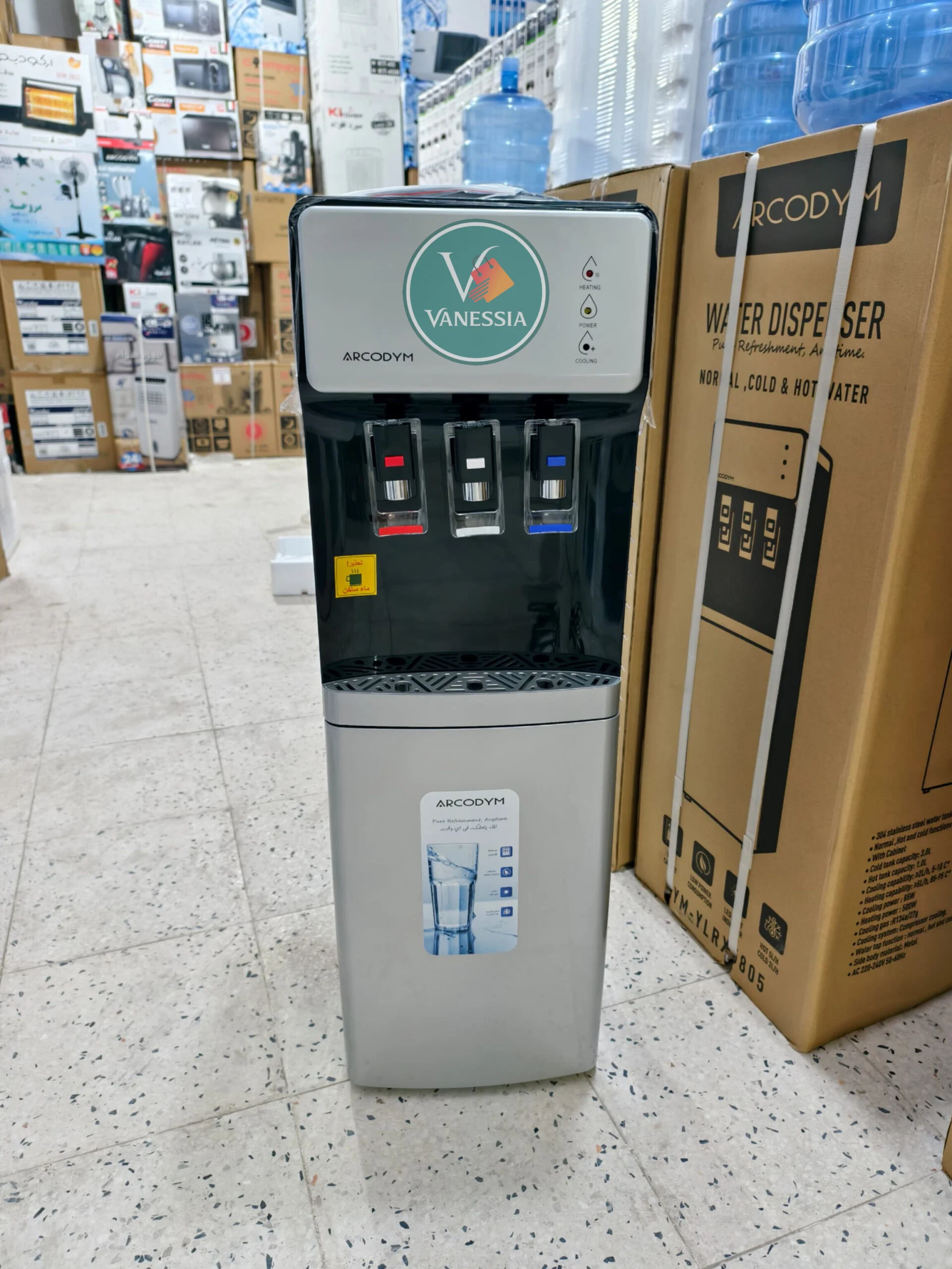 Fontaine marque arcodym avec la bouteille Gratuite